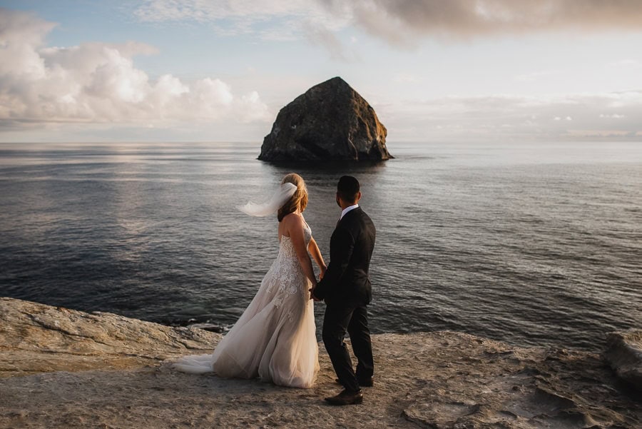 Bride and Groom overlooking the Oregon Coast at sunset