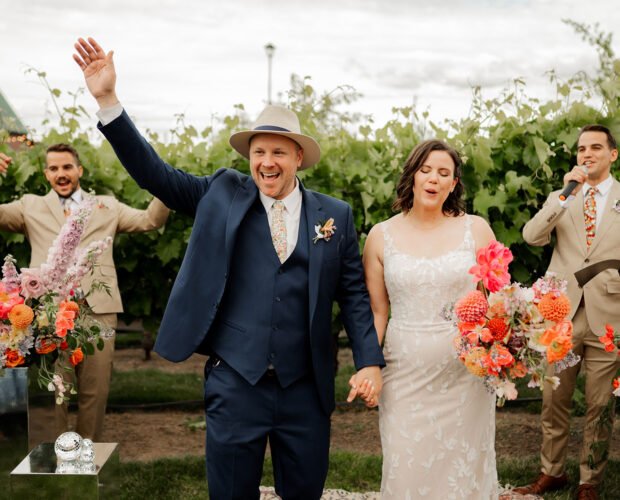 Two wedding officiants at a wedding in Portland, Oregon.